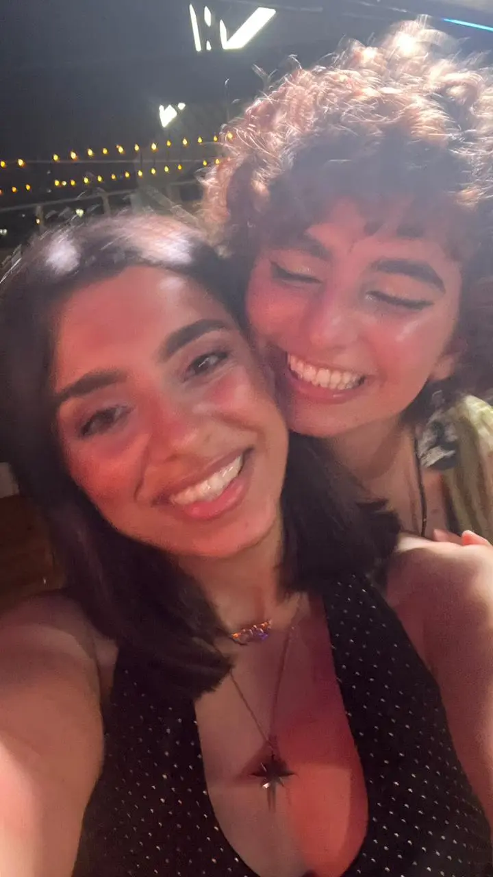 Mary and her cousin smiling
