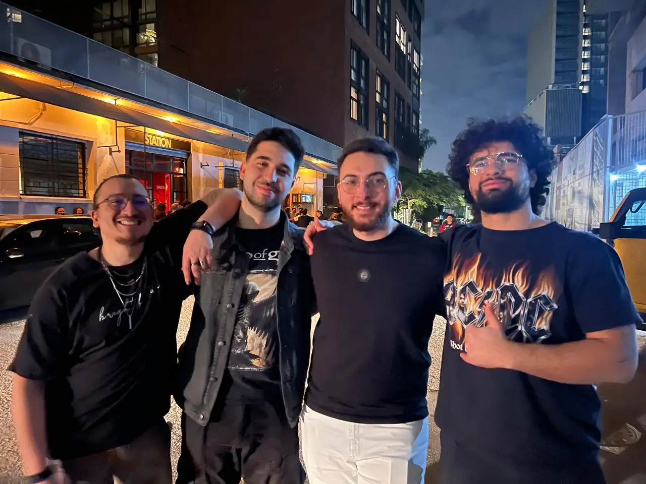 Four friends squeezed into one frame